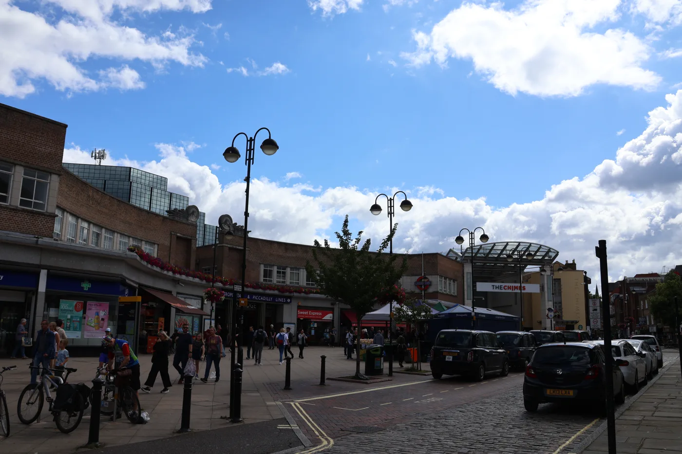Uxbridge town centre, looking towards the station entrance and The Chimes, photographed in August 2023